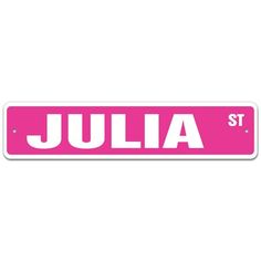 a pink street sign that says julia st