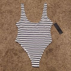 Brand New With Tags, Protective Sticker Still Attached Size Medium Scoop Neckline 87% Nylon, 13% Elastic Style: As129 Rn: 120064 Check Out My Other Closet Listings, Bundle And Save On Shipping! :) Striped Lined Bodysuit For Vacation, Striped Bodysuit With Lined Body For Vacation, Trendy White Lined Bodysuit, Striped Stretch One-piece Bodysuit, Striped Fitted Bodysuit For Beach, Summer Sleeveless Striped Bodysuit, Summer Striped Sleeveless Bodysuit, Striped Fitted Bodysuit For The Beach, Striped Sleeveless Bodysuit For Summer