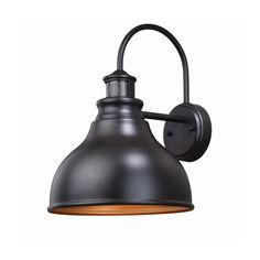 an industrial style wall light with a black shade on the top and wood accents around it