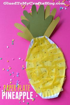 a paper plate pineapple craft with sprinkles on it and a pink background