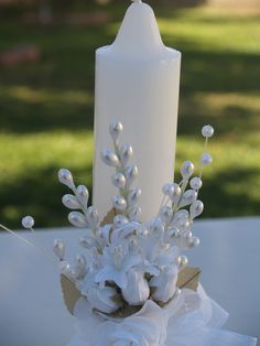 White candle For First Communion Or for Baptism, for Boy or Girl! Meticulously hand adorned with high quality materials: a lace cross, please look at the details in the pictures, a big white Organza Ribbon Bow with beautiful handmade satin flower; Fine elegance For Baptism! For First Communion! Dimensions: 9'' x 1.5'' I pack it in a fancy gift white box for keepsake. FINAL SALE, PLEASE CONTACT FOR ANY QUESTIONS OR HELP. ~ * ~ * ~ * ~ * ~ * ~ Finishing Touches... Invitations for Girls https://www Communion Candles, Ceremony Traditions, Cross Candle, Vintage Baptism, Candle Beautiful, Baptism Centerpieces, Christening Candle, Small Crystals, Baptism Candle