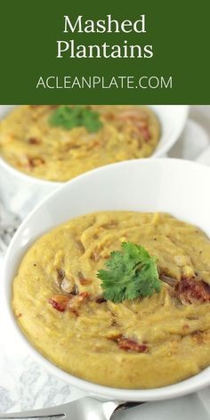 two white bowls filled with mashed potatoes and garnished with cilantro