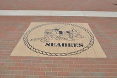 there is a sign on the ground that says seabees