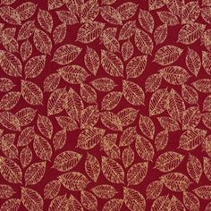 a red background with gold leaves on it