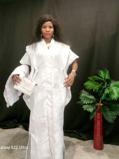 Damask dress for women reading to wear, made with good quality damask design and Gold quality Mikado .  It has adjustable rope inside the dress to adjust for perfect fitting.  Color: white Size: M/L Elegant White Long Sleeve Agbada, Elegant White Fitted Kaftan, Elegant Fitted White Kaftan, Fitted Long White Kaftan, White Fitted Long Kaftan, Elegant White Formal Kaftan, Elegant White Agbada For Wedding, Elegant Short Sleeve Kaftan, White Damask Dress