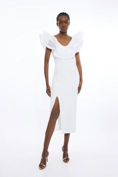 Ruffle Ponte And Cotton Mix Jersey Side Split Midi Dress | Karen Millen Spring Ruffle Maxi Dress For Wedding Guest, Feminine Evening Midi Dress With Ruffled Straps, Feminine Ruffled Straps Evening Midi Dress, Feminine Ruffled Straps Midi Dress For Evening, Elegant White Midi Dress With Ruffled Straps, White Elegant Midi Dress With Ruffled Straps, Elegant Midi Dress With Flutter Sleeves For Date Night, Summer Party Maxi Dress With Flutter Sleeves, Formal Maxi Dress With Ruffled Straps For Summer