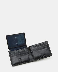 This men's classic wallet is a timeless accessory for any gentleman. Made of high-quality leather, it offers both style and durability. Featuring multiple card slots and a bill compartment, it is both functional and sleek. Invest in this wallet for a practical and sophisticated addition to your wardrobe. RFID Technolog Classic Black Trifold Wallet For Business, Formal Trifold Card Holder With Coin Pocket, Classic Black Trifold Wallet With Coin Pocket, Formal Bifold Wallet With Coin Pocket, Classic Trifold Card Holder For Formal Occasions, Classic Formal Trifold Wallet With Interior Card Slots, Classic Black Bifold Wallet, Classic Bifold Wallet For Formal Occasions, Classic Bifold Business Card Holder