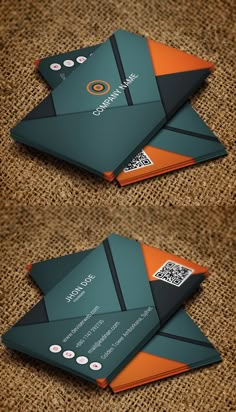 two business cards with orange and black accents