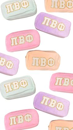 six different colored candys with the word tbo in gold and white on them