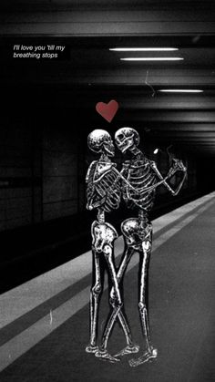 two skeletons standing next to each other in a parking garage with a red heart above them