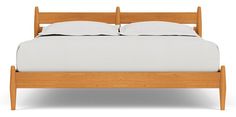 a wooden bed with white sheets and pillows on it's headboard, against a white background