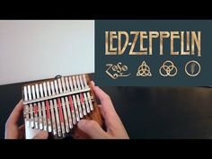 a person playing an instrument with the words ledzepelin on it