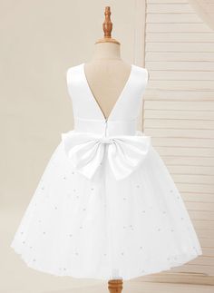 Ball-Gown/Princess Satin Tulle Knee-length Toddler Flower Girl Dress White / 12M Product Code: 227576         Embellishment: Beading,Bow             Fabric: Tulle,Satin             Silhouette: Ball-Gown/Princess             Neckline: Scoop Neck             Sleeve: Sleeveless             Hemline/Train: Knee-length             Back Style: Back Zip,V Back Flower Girl Dresses Knee Length, Straight Wedding Dresses, Bow Fabric, Toddler Flower Girls, Ball Gowns Princess, Toddler Flower Girl Dresses, Red Pearl, White Flower Girl Dresses, Tulle Flower Girl