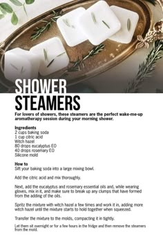 an advertisement for shower steamers with soap cubes and rosemary sprigs on it