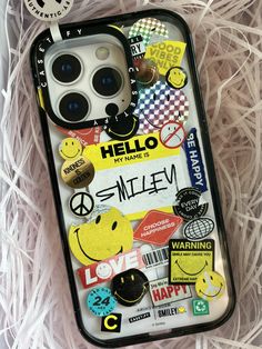 an iphone case with many stickers on it