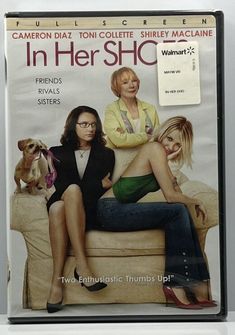 the dvd cover for in her shec shows two women sitting on a couch with their legs crossed