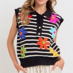 Refresh Your Casual Wardrobe With Our Flower Patch Stripe Knit Top. This Charming And Versatile Top Is Designed To Be Both Comfortable And Stylish, Making It A Perfect Choice For Everyday Wear. Key Features: Fabric: Made From A Blend Of 65% Acrylic, 20% Polyamide, And 15% Polyester, Providing A Soft, Durable Texture. Fit: Features A Sleeveless Silhouette For A Relaxed And Breezy Feel. Color Options: Available In Black With Ivory Stripes. Sizes: Offered In Sizes S, M, And L To Fit Various Body Sh Black Sweater Vest For Spring, Casual Knit Tops With Floral Print, Casual Knit Top With Floral Print, Trendy Knit Tops With Floral Print, Knit Top With Floral Print For Spring, Trendy Multicolor Sweater Vest For Spring, Casual Multicolor Sweater Vest For Spring, Casual Summer Sweater With Floral Print, Summer Knit Sweater With Floral Print