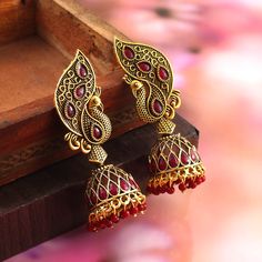 Overview These stylish Jhumki Earrings set from JewelryTrack will certainly leave you spellbound. These Jhumki Earrings set have an excellent finish and gives out an exquisite sense of style. If you are looking for an amazing Fashion Jewelry set for special occasions such as Anniversary, Engagement, Party, Wedding or for gifting , then your search ends here. Item Description: The look is stunning and preciously suitable for all kinds of dressy occasions. Metal: Brass OCCASION: PARTY WEAR , WEDDI