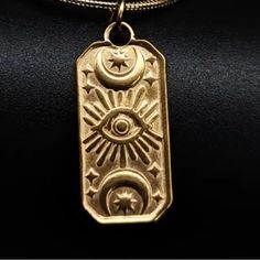 “Symmetry In The Stars” Evil Eye Sunburst Sunrays Eye Of Ra Crescent Moon Mystical Tarot Egyptian Rectangular Sky Totem Celestial Cosmos Astrology Astronomy Universe Galaxy 18k Gold Double Sided Necklace. A Central Image Of An Evil Eye With Radiating Sunbeams/Eye Of Ra Is Sandwiched By Symmetrical Horizontal Crescent Moons With Little Stars Nestled Inside. Two Stars Frame The Moons On Either Side. Double-Sided! On A Link Chain. 18k Gold. Hypoallergenic. Lead & Nickel Free. Unisex Women Or Men. New. *Matching Earrings Also Available! Measurements: Pendant Length: 0.9” Pendant Width: 0.4” Chain Length: 16” (+ 2” Extender Chain) If You Want It, Don’t Let It Get Away S Jeweled Necklace, Eye Of Ra, Universe Galaxy, 18k Gold Necklace, In The Stars, Evil Eye Charm, Evil Eye Jewelry, Gold Design, Crescent Moon