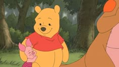 winnie the pooh and piglet from disney's animated movie, with trees in the background