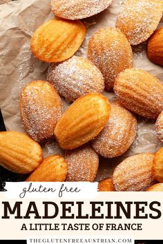 almonds and powdered sugar on top of parchment paper with text overlay reading gluten free madeleines a little taste of france