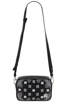 Find AMIRI Bandana Camera Case Bag on Editorialist. Amiri Bandana Camera Case Bag in Black Leather exterior with Amiri logo detail embroidered and ripstop lining. Made in Italy. Top zipper closure. One main compartment. Detachable shoulder strap. Measures approx 7.5 W x 5 H x 2 D Shoulder strap with a 16.5 drop. AMIF-MY70. AMBGCM1006. About the designer: Mike Amiri's eponymous label fuses rock and roll with haute couture. Deriving its inspiration from Amiri's upbringing in Hollywood, the Califor Amiri Logo, Mike Amiri, California Contemporary, Dope Outfits For Guys, Hand Painted Leather, Embellished Denim, Painting Leather, Camera Case, Dope Outfits