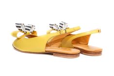 "Handmade yellow flat leather slingback sandals, embellished with double bow and easy to put they are must have pair of shoes for every summer yet to come. They will simply add a kick to any summer outfit you choose. Wedding or not here they come. The cushioned insole will make them only inseparable part of everyday choice. They're designed to look stylish enough to take you \"from day to night. Full leather outer, interior and sole. DETAILS: Full leather upper, lining and sole Pink napa leather Summer Party Flats With Leather Sole, Yellow Slingback Sandals With Removable Insole, Summer Party Slingback Flats, Closed Toe Sandals With Bow For Summer, Summer Flats With Bow, Leather Sandals With Bow For Spring, Chic Yellow Slingback Pumps For Summer, Summer Bow Flats, Spring Bow Strap Sandals With Round Toe