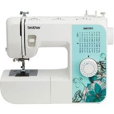 the sewing machine is white and has blue flowers on it's front side,