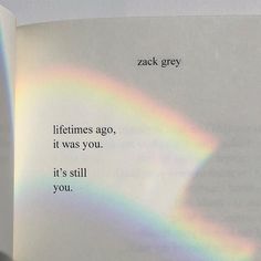 an open book with a rainbow in the middle and some writing on it that says,'sometimes ago, it was you it's still you '