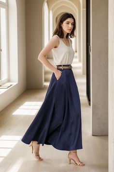 "You'll feel ultra chic and modern wearing the A Line skirt throughout the year, the long skirt will be a prefect on for your summer spring.Can be worn with a white top for a more trendy look. DETAIL *50% Linen, 50% cotton *No Liner *Two side pockets *Back elastic waistband *Right Hidden Zipper closure *Ankle length *Belt model wears is not for sale * Perfect for Summer and spring *Machine Washable in Warm/Cold Water/Do not bleach /Mid-iron /Hang Dry More Color https://etsy.me/3t1IjnY CUSTOM ORDER Can't find your size in our size Chart Chang the Length Your Height is not Between 5'1\" - 5\"9\" Your weight is not Between 47 kg - 75 kg SIZE GUIDE Size vary between Brand and Country Please get your body measurement with our Size Guide And Find your size in our Size Chart SIZE CHART https://ww Flowy Solid Color Maxi Skirt, Chic Long Skirt In Solid Color, Chic Long Solid Color Skirt, Summer Wide Leg Maxi Skirt With Pockets, Summer Maxi Skirt With Pockets, Chic High Waist Maxi Skirt With Pockets, Spring Maxi Skirt With Pockets, Chic Wide Leg Pleated Maxi Dress, Solid Color Maxi Skirt For Summer