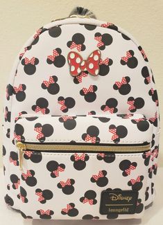 Minnie Mouse Loungefly Minnie Mouse Disney Mini Backpack. A perfect gift for any Disney fan.  All my bags are brand new with the original tags. Smoke free home. Size: approximately 9x5x11. The photos for this listing are stock photos. This means that the print design on the bag shown in the pictures, is not necessarily the exact bag that you will receive. It will have all the same characters. They just might be featured in different locations on the bag. I leave feedback for all of my transactio Cute Red Backpack With Adjustable Strap, Cute Minnie Mouse Backpack For Daily Use, Red Minnie Mouse Backpack For Disney Trips, Red Disney Minnie Mouse Backpack, Trendy Minnie Mouse Travel Backpack, Disney Red Minnie Mouse Backpack, Disney Minnie Mouse Red Backpack, Cute Red Bag For Disney Trips, Trendy Minnie Mouse Backpack For Travel