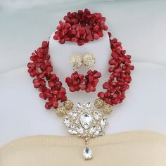 Elevate your Nigerian wedding or party look with this Bead Jewelry. Handcrafted with care, these jewelry pieces add a touch of color and cultural significance to your ensemble, making you stand out with traditional elegance. African Wedding Jewelry, Coral Beads Necklace, Nigerian Wedding, Party Look, African Wedding, Coral Beads, Bead Jewelry, Party Looks, Bead Necklace