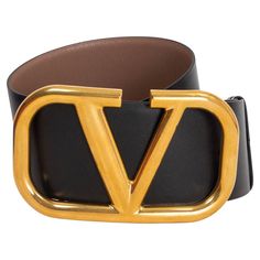 100% authentic Valentino VLOGO wide reversible waist-belt in light tan and black calfskin featuring a chunky gold-tone metal logo buckle. Has been worn once or twice and is in excellent condition. Comes with dust bag and box. Measurements Tag Size 75 Width 7cm (2.7in) Fits 72cm (28.1in) to 77cm (30in) Length 105cm (41in) Buckle Size Height 9.5cm (3.7in) Buckle Size Width 16cm (6.2in) Hardware Gold-Tone All our listings include only the listed item unless otherwise specified in the description ab Luxury Black Belt Buckle With Gold-tone Logo Plaque, Designer Black Belt With Gold-tone Logo Plaque, Modern Black Belt With Gold-tone Logo Plaque, Designer Black Belts With Gold-tone Logo Plaque, Black Belt Buckles With Gold-tone Hardware For Work, Chic Black Belt With Gold-tone Logo Plaque, Classic Black Belt With Logo, Modern Black Belt Buckle With Gold-tone Logo, Designer Leather Belt Buckles With Logo