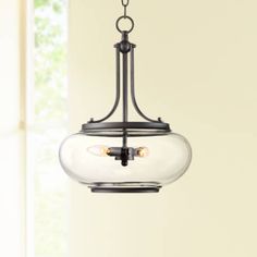 a light fixture hanging from a ceiling in a room