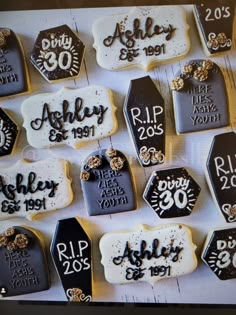 decorated cookies are displayed on a table for someone's 30th birthday party or celebration