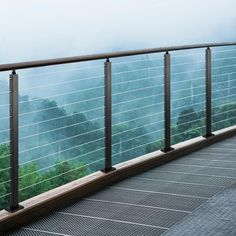 a metal railing on top of a wooden deck