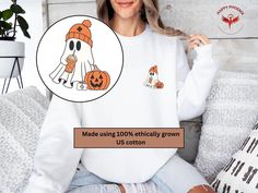 Celebrate Halloween in style with this adorable Nurse Ghost Sweatshirt! Featuring a cute nurse ghost sipping on a cup of coffee, this cozy sweatshirt is perfect for healthcare heroes who want to embrace the spooky season.  Whether you're working a shift or enjoying a day off, this sweatshirt makes a great gift for yourself or the special nurse in your life. Embrace the Halloween vibes and show off your profession in style! Made using 100% ethically grown US cotton. Gildan is also a proud member Cute Cotton Halloween Sweatshirt, Nurse Sweater, Healthcare Heroes, Halloween Apparel, Ghost Sweatshirt, Cute Nurse, School Nurse, Halloween Nurse, School Tees