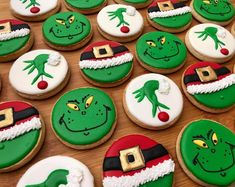 decorated christmas cookies on a wooden table