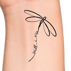 a woman's arm with a tattoo on it that says, i love you in cursive writing