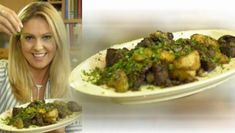 a woman holding a plate with food on it