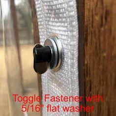 a close up of a door handle with the words toggle fastener with 5 / 16'' flat washer