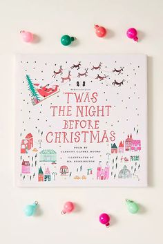 a book with christmas decorations around it and the title i was the night before christmas