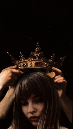 a woman with a crown on her head