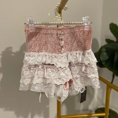 Ruffle Shorts Size M Super Stretchy To Fit And Get On But It Also Snugs And Hugs The Waist Material: Polyester Color: Pink Lace Ruffle Bottoms For The Beach, Beach Lace Bottoms With Ruffles, Lace Ruffle Bottoms For Beach, Lace Ruffle Beach Bottoms, Lace Ruffled Beach Bottoms, Cute Lace Bottoms For Spring, Pink Bottoms For Summer Brunch, Chic Pink Shorts For Brunch, Chic Pink Bottoms For Brunch