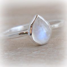 Teardrop Moonstone Gemstone Ring, Spiritual Teardrop Moonstone Ring, Handmade Moonstone Teardrop Ring, Silver Teardrop Moonstone Ring, Adjustable Teardrop Moonstone Ring In Sterling Silver, Teardrop Moonstone Promise Ring, Spiritual Moonstone Teardrop Ring, Sterling Silver Teardrop Moonstone Ring, Silver Teardrop Moonstone Ring For Anniversary