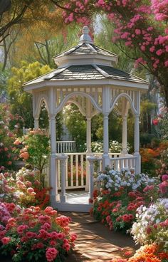 a white gazebo surrounded by flowers and trees