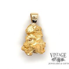 A heavyweight nugget design pendant, cast in a rich 22 karat gold (assay) and suspended from a 14 karat gold tapered bail. A sparkling round, .13 carat, G color, VS1 clarity, natural diamond is bead set to the side of the pendant. 14k Stamped Yellow Gold Nugget Jewelry, 14k Yellow Gold Nugget Jewelry, Gold And Diamond Pendant, Bead Set, Diamond Pendant, Belly Button Rings, Bracelet Watch, Natural Diamonds, Sparkle