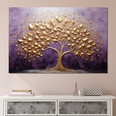 an abstract painting of a gold tree on purple background