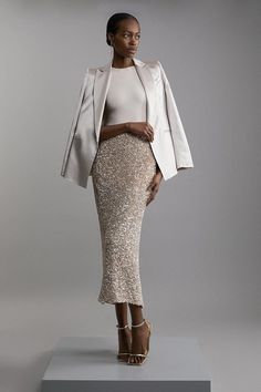 Textured Sequin Midaxi Skirt | Karen Millen Gold Sparkle Skirt Outfit, Chic Sequin Outfit, Gold Skirt Outfit Ideas, Sequin Skirt White Button Down, Gold Midi Skirt Outfits, Cream Christmas Outfits, Gold Christmas Outfit, Sequin Skirt Outfit Dressy, Sequin Midi Skirt Outfit