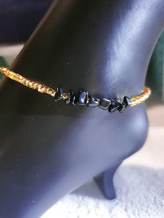 * gold glass beaded anklet or bracelet with Black Obsidian Gemstone Chips  * choose your size from the drop down list. If you need a different size or color just msg me * Check out our charms listing! We can do an anklet for you using most of the charms shown. Just ask! Personalize it! Gold charms Check out this item in my Etsy shop https://www.etsy.com/listing/797791097/afrocentric-charms-gold-charms-african Handmade Spiritual Gold Anklet, Gold Beaded Anklets For Gift, Gold Adjustable Anklets With Round Beads, Adjustable Gold Anklet With Round Beads, Bohemian Gold Anklets With Round Beads, Gold Bohemian Anklets With Beaded Chain, Gold Bohemian Beaded Chain Anklets, Gold Beads Anklets As Gift, Gold Beaded Anklet As Gift